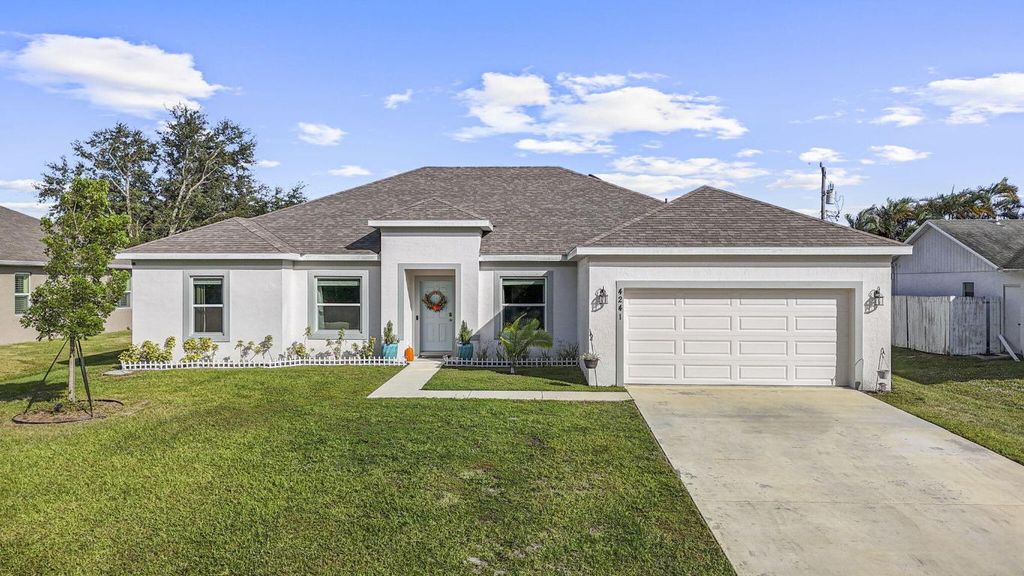 Photo of 4241 SW Tuscol Street, Port Saint Lucie, FL 34953 (MLS # R11140831)