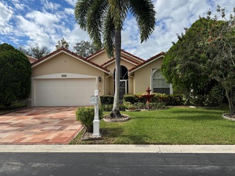 Photo of 2705 Pointe Circle, Greenacres, FL 33413 (MLS # R11137047)