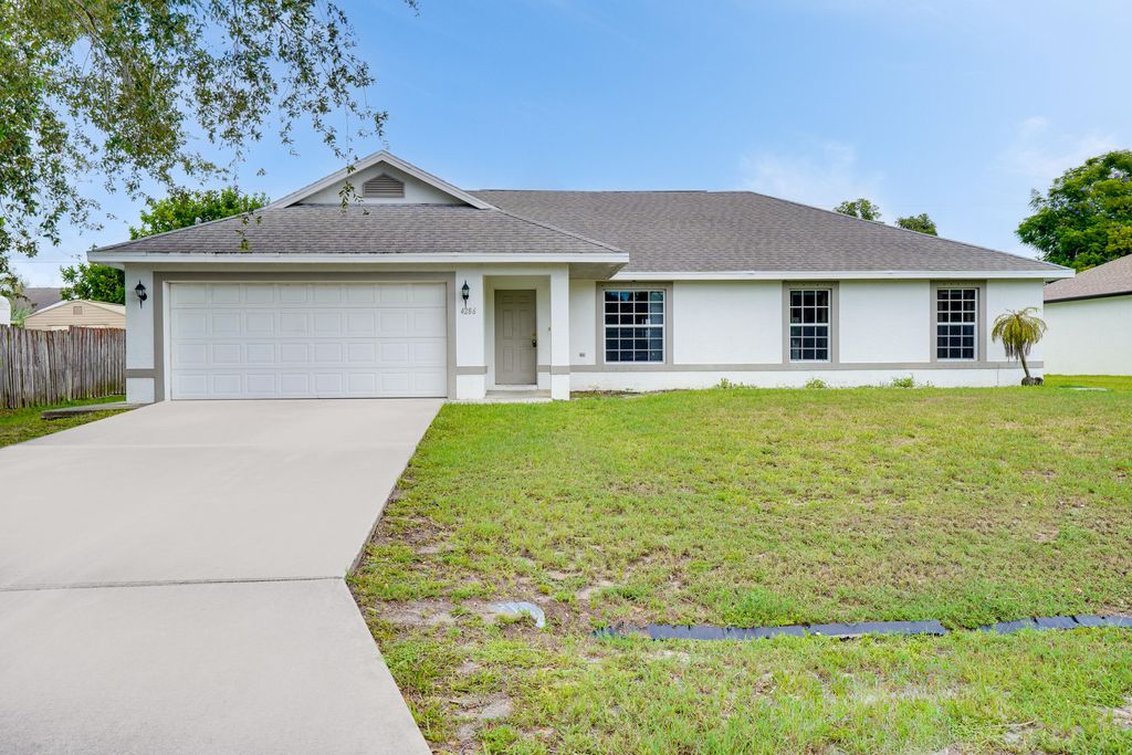 Photo of 4286 SW Carl Street, Port Saint Lucie, FL 34953 (MLS # R11094617)