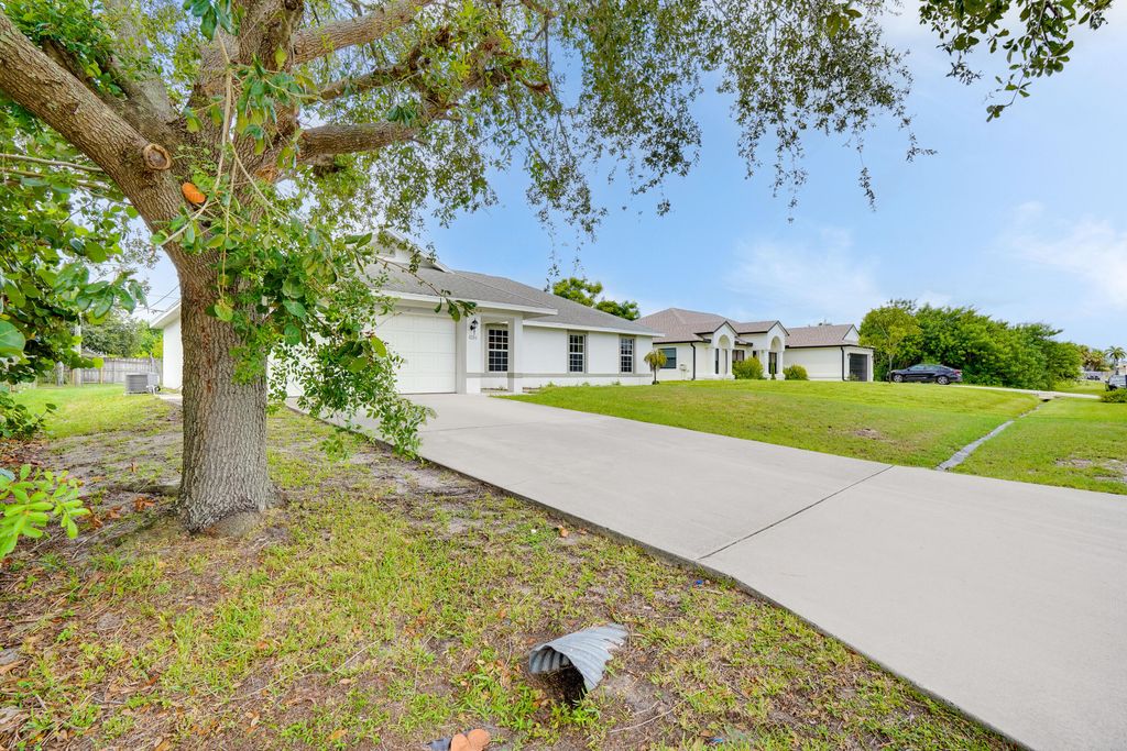 Photo of 4286 SW Carl Street, Port Saint Lucie, FL 34953 (MLS # R11094617)