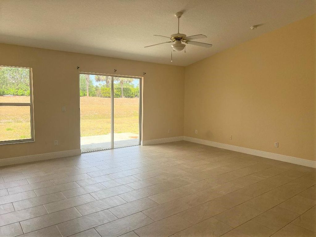 Photo of 355 SW Fairway Avenue, Port Saint Lucie, FL 34983 (MLS # R11128459)