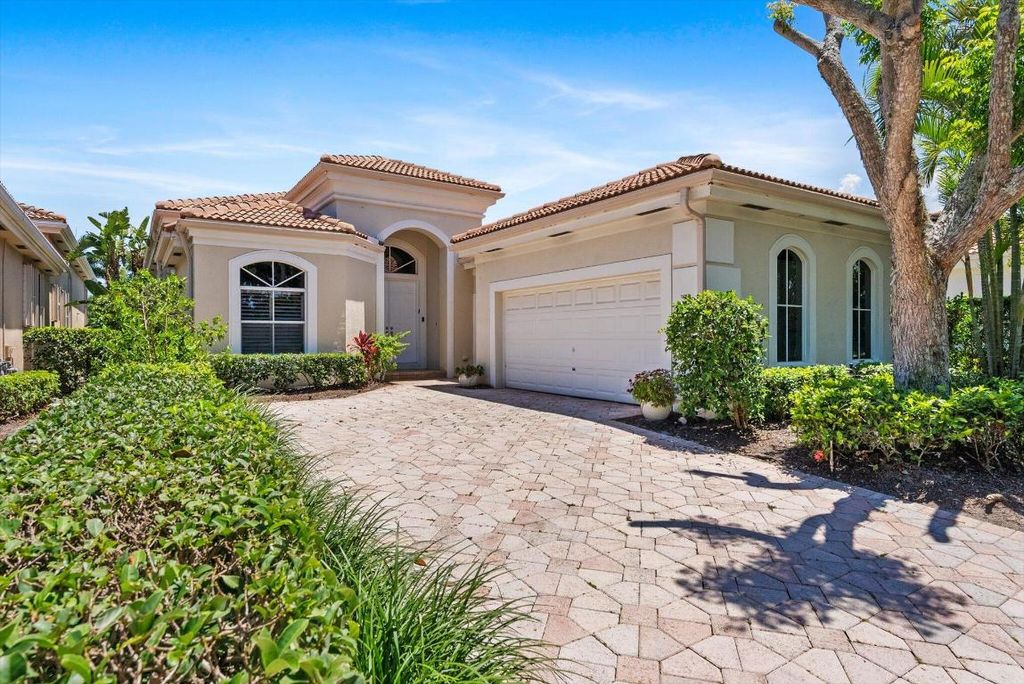 Photo of 104 Isle Drive, Palm Beach Gardens, FL 33418 (MLS # R10991648)