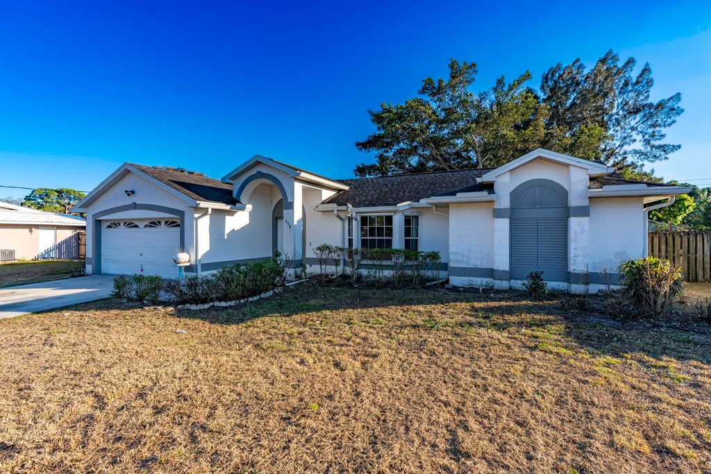 Photo of 298 SW Eyerly Avenue, Port Saint Lucie, FL 34953 (MLS # R11162973)