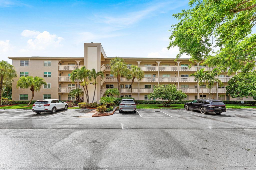 Photo of 3301 Aruba Way #C1, Coconut Creek, FL 33066 (MLS # B26018357)