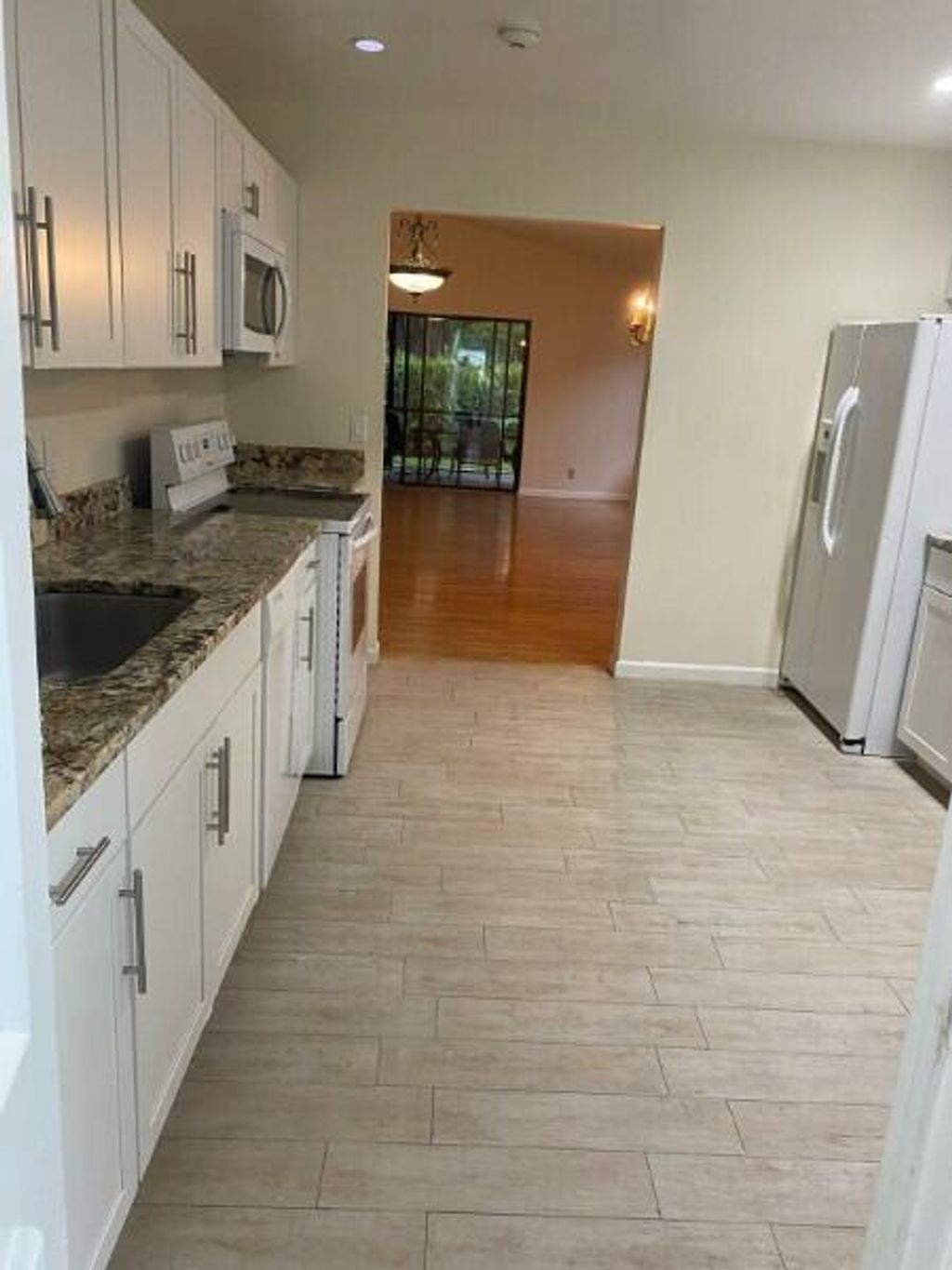 Photo of 79 Ironwood Way N, Palm Beach Gardens, FL 33418 (MLS # R11015704)