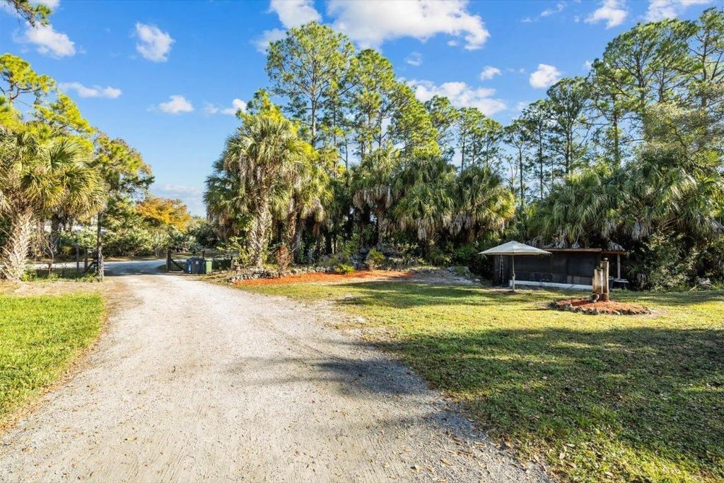 Photo of 16888 Hialeah Drive W, The Acreage, FL 33470 (MLS # B26033655)