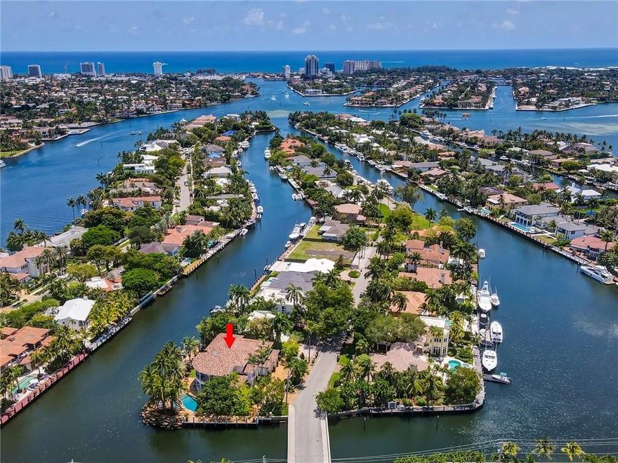 Spectacular 6BR+Bonus/6+1BA/3CG+, pool home boasts 300' of waterfrontage perfectly positioned on one of the premiere expansive point lots in Rio Vista Isles. Enjoy 180+ degree water views throughout this exquisite estate. Chef's Kitchen (w/ gas), grand executive office/library (or 6th BR), 2 living rooms (one up & one downstairs), quadruple split floor plan, all ensuite bedrooms. Smarthome, whole house generator. True resort-style home--swim-up summer kitchen w/ submerged seating, free-form pool & hot tub, waterfall, loggias, concrete dock w/ floating dock, cabana bath, lush tropical landscape offering a park-like feel in your very own tropical paradise. Prime Boating-Great turning radius on extra-wide canal only minutes to Intracoastal, Lauderdale Yacht Club & Inlet
