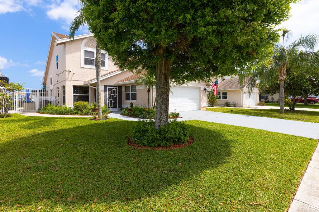 Photo of 3875 Circle Lake Drive, West Palm Beach, FL 33417 (MLS # R11150253)