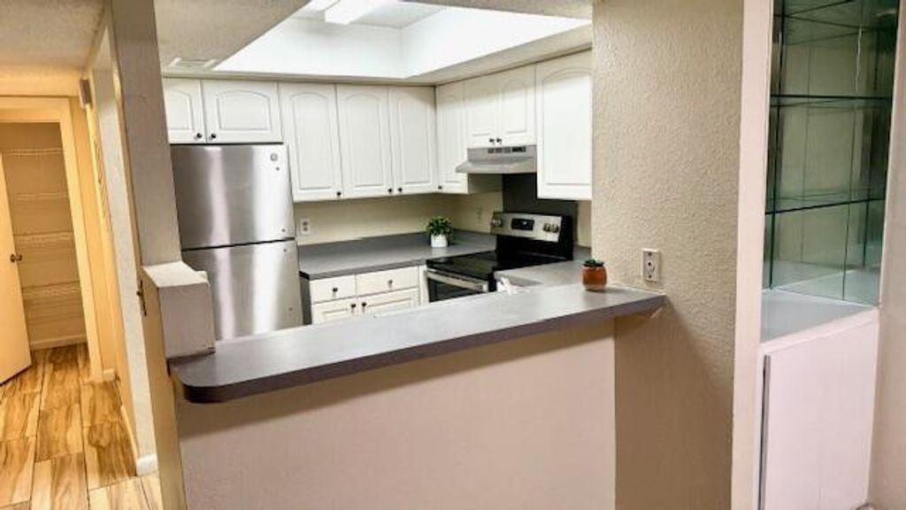 Photo of 1520 SE Royal Green Circle #107, Port Saint Lucie, FL 34952 (MLS # R11081279)