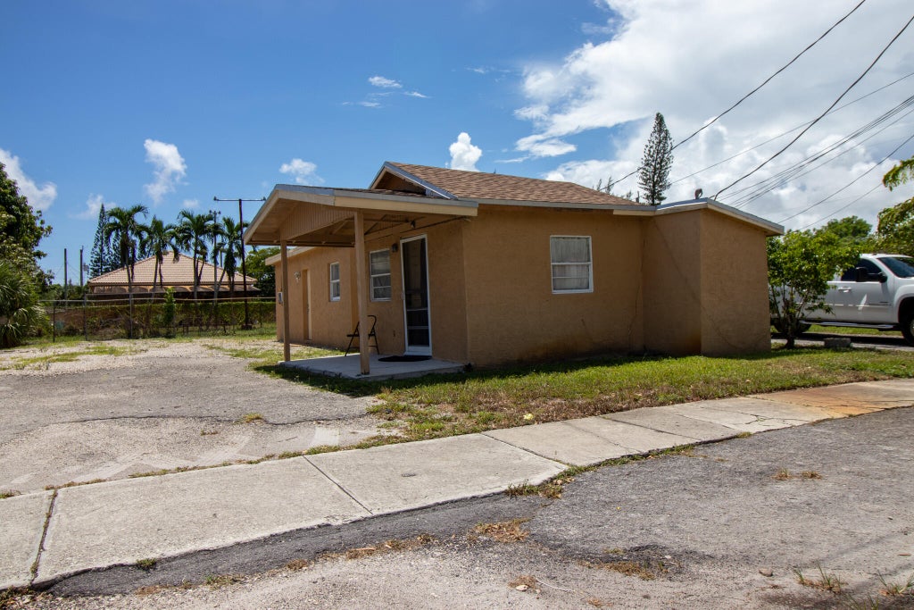 Photo of 242 SW 7TH Court, Deerfield Beach, FL 33441 (MLS # B26071485)