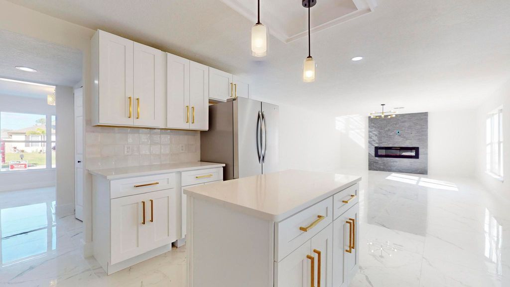 Photo of 2056 SW Grant Avenue, Port Saint Lucie, FL 34953 (MLS # R11169725)