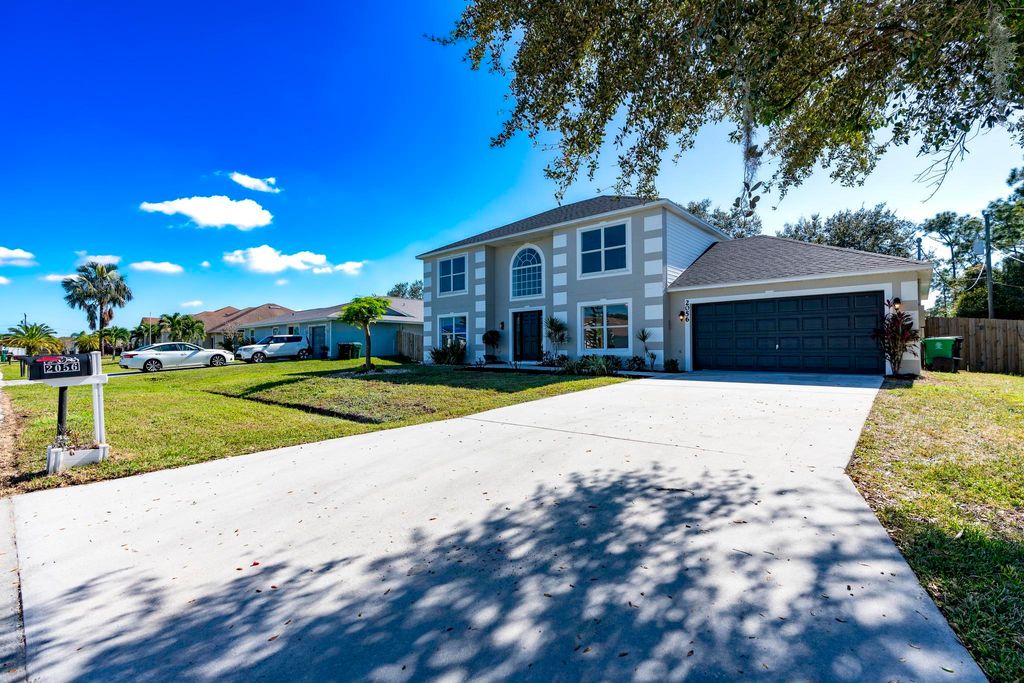 Photo of 2056 SW Grant Avenue, Port Saint Lucie, FL 34953 (MLS # R11169725)