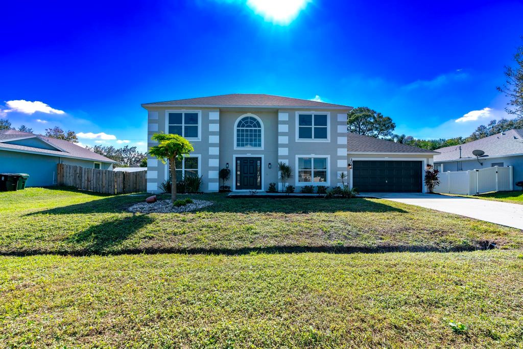 Photo of 2056 SW Grant Avenue, Port Saint Lucie, FL 34953 (MLS # R11169725)