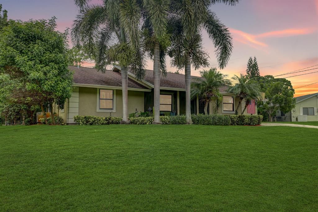 Photo of 3012 SW Collings Drive, Port Saint Lucie, FL 34953 (MLS # R10737888)