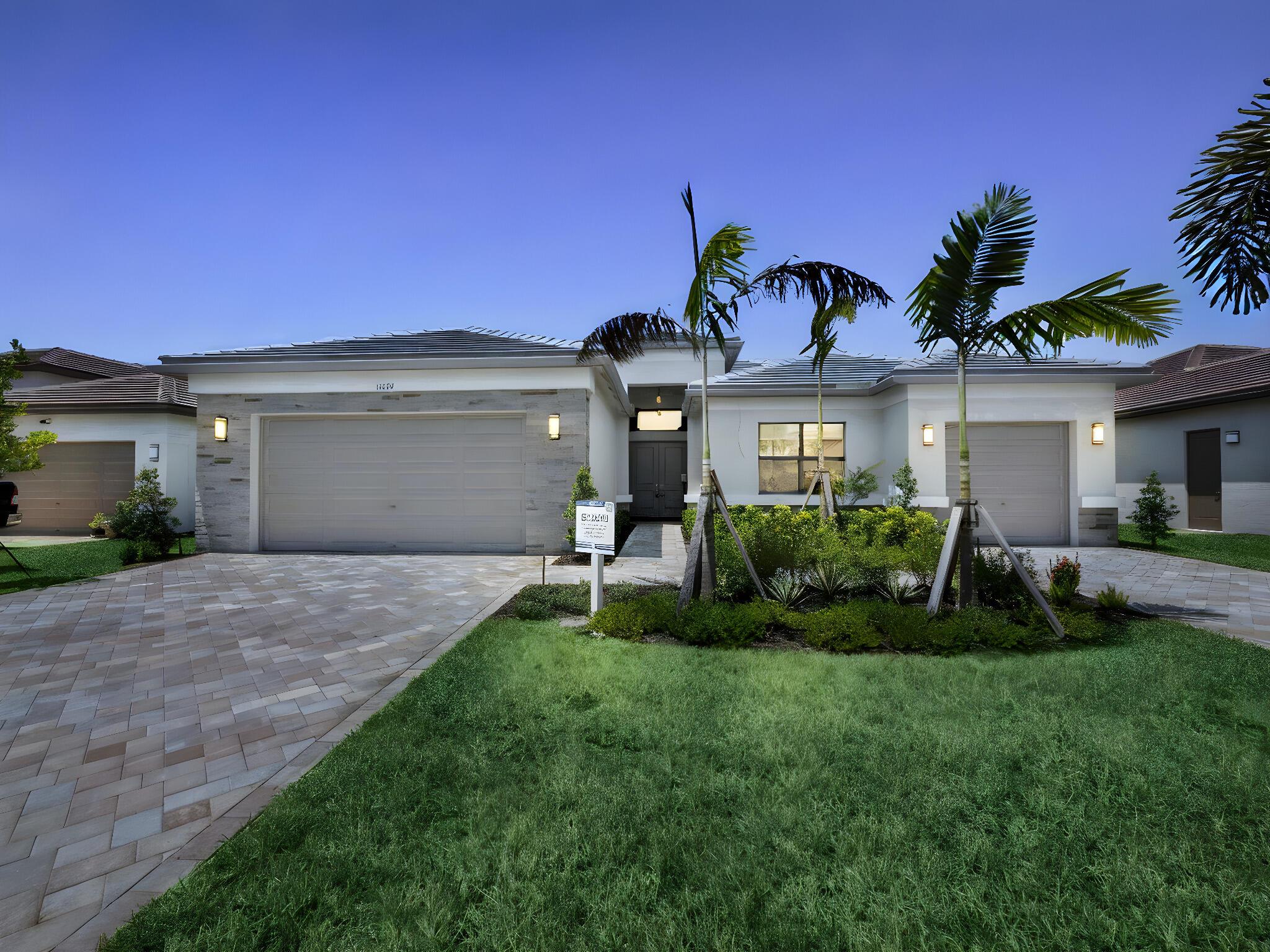 Valencia Walk at Riverland is where you'll find Port St. Lucie's best 55+ lifestyle with a million ways to have fun including a beautiful 37,000-square foot Clubhouse with resort-style amenities. This highly sought-after Bellagio floor plan includes private landscaped views and an open floor plan with contemporary porcelain 24''x24'' matte tile flooring throughout all the entire home. The home features high end finishes including impact glass windows, GE gas appliances, tile roof, and recessed LED lighting. The chef's kitchen includes contemporary quartz countertops with full quartz backsplash, painted 2-tone white and grey maple, shaker style cabinets, custom cabinet pantry built-in, and GE stainless-steel appliances include chimney style hood. All luxury bathrooms include quartz