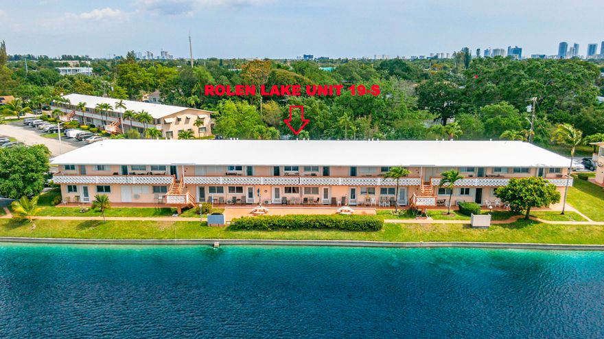 MOVE RIGHT-IN! Spotless unit with GREAT VIEW OF THE LAKE sold FURMISHED TURNKEY! Enjoy the water view with your monrning coffe or your afternoon coaktail on your private terrace. Ne Need to shop,  this unit is very well furnished and everythig stay even the beach chairs! This unit offers new IMPACT WINDOWS AND DOORS just installed in 2025 .  Kichen cabinets have been repaited with newer countertop and white tile backsplash. Clean ceramic tile set diagonally thru-out. Updated ceiling fans and interior dorrs. Bathroom updated with newer vanity, medecine cabinet & toilet. Large pantry inside unit. Bedroom facing the lake with wall to wall closet. Cash only, 55+ community with clubhouse, librairy, small gym, billiard, pool , BBq, shuffleboad and park. Seasonal renting allowed afer one year.    40 YEARS REPAIRS CERTIFICATION DONE!  Building well maintained with updated roof  (2024) and  complete new plumbing done in 2025 under building.    Building with reserves .