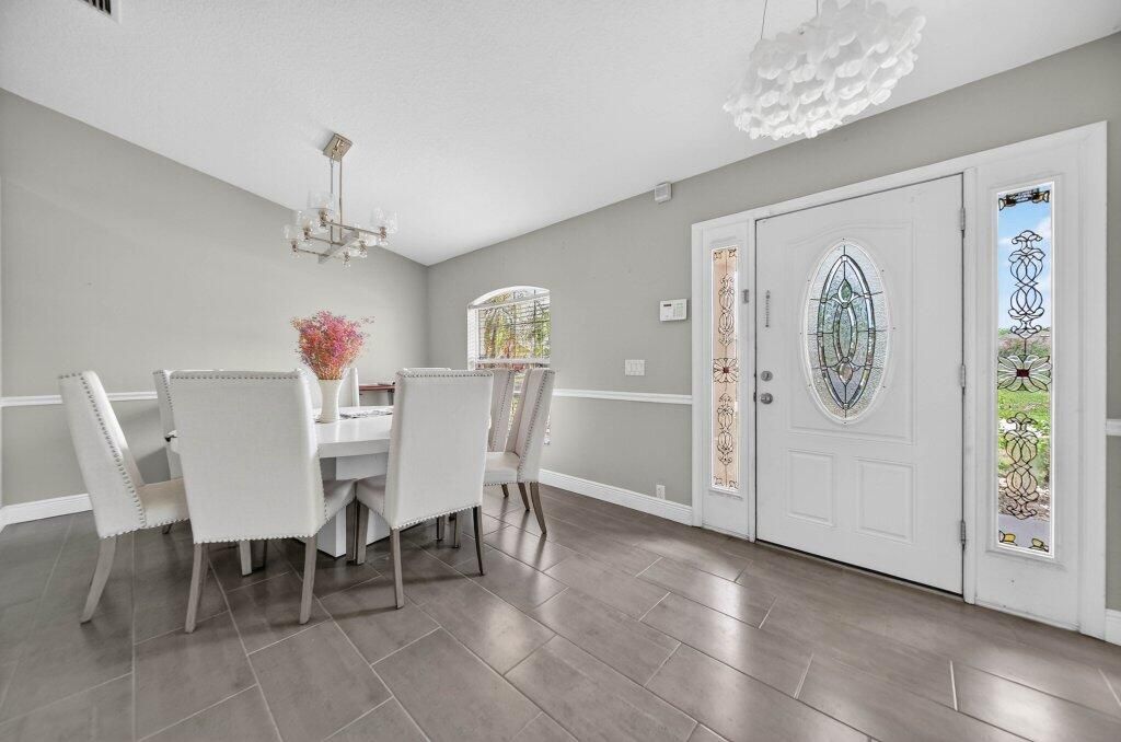 Photo of 982 SW Kappa Avenue, Port Saint Lucie, FL 34953 (MLS # B26025176)