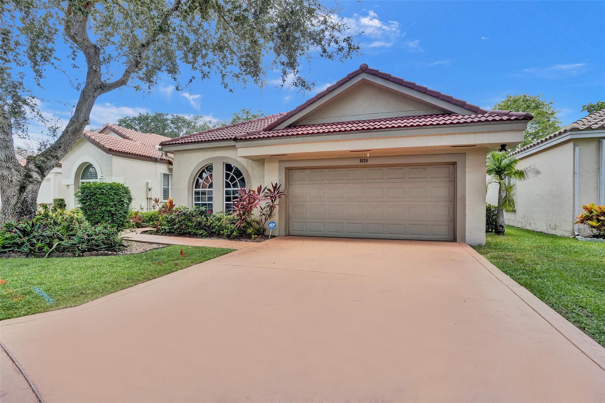 Welcome to this beautifully renovated 4-bed, 2-bath home in North Springs. Known for its A-rated schools, this home blends modern design & everyday comfort. Inside you'll find an open-concept filled with natural light, vaulted ceilings, & a split floor plan. The kitchen is a showstopper with high-gloss white cabinets, black hardware accents, island with seating & storage, and a built-in wine fridge at the bar area. The primary suite offers a spacious retreat, custom closet & bathroom with dual sinks, tub, & separate shower. Additional highlights: recessed LED lighting throughout, separate laundry room with a utility sink, & 2-car garage. Enjoy the benefits of low HOA fees, which covers lawn care & a community pool. This home offers the perfect combination of style, comfort, and location.