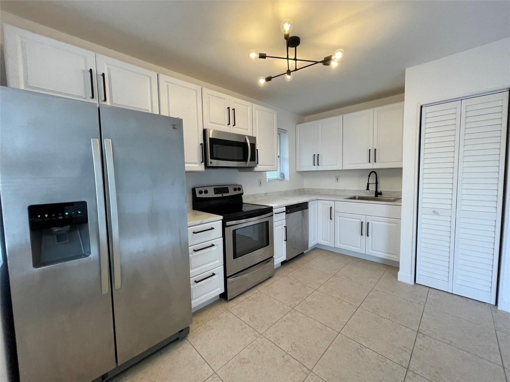 Photo of 4071 N DIXIE Highway #20, Oakland Park, FL 33334 (MLS # B26091329)