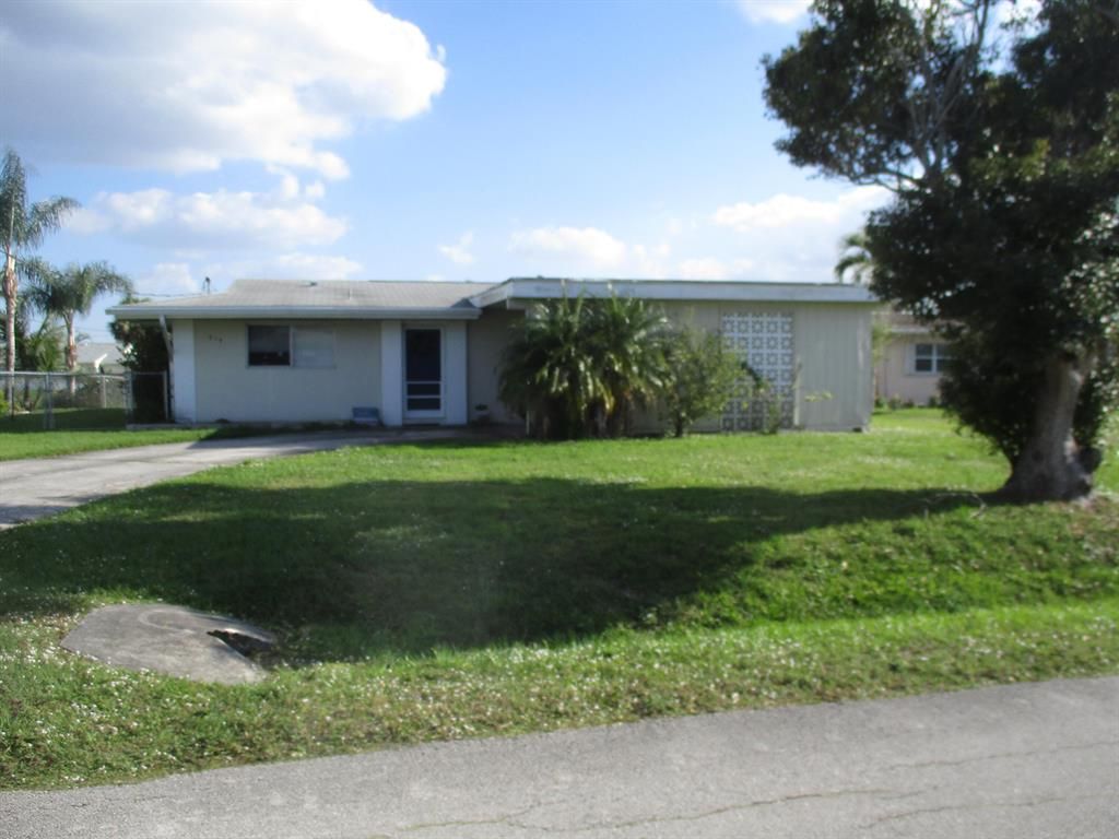 Photo of 217 Olive Avenue, Port Saint Lucie, FL 34952 (MLS # R10767059)