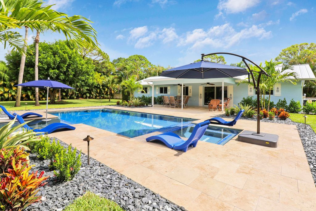 Photo of 18967 Quail Run Drive, Jupiter, FL 33458 (MLS # R10923829)