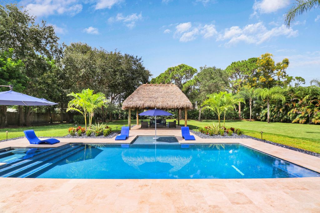 Photo of 18967 Quail Run Drive, Jupiter, FL 33458 (MLS # R10923829)