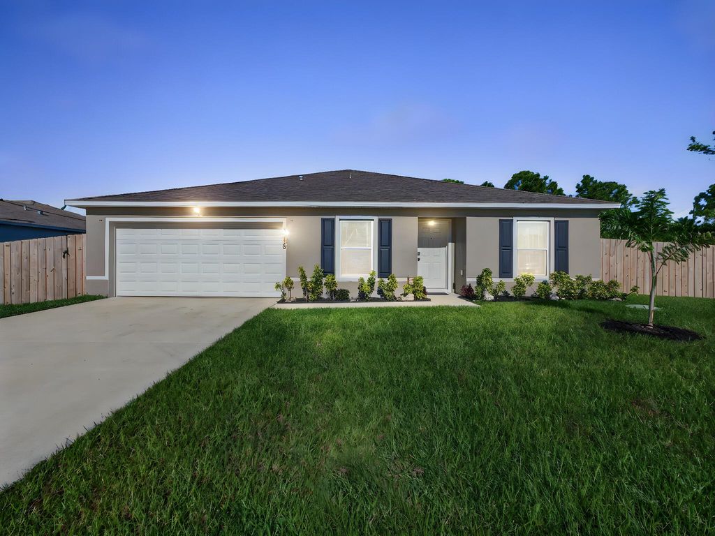 Photo of 1716 SW Palermo Road, Port Saint Lucie, FL 34987 (MLS # R11133055)