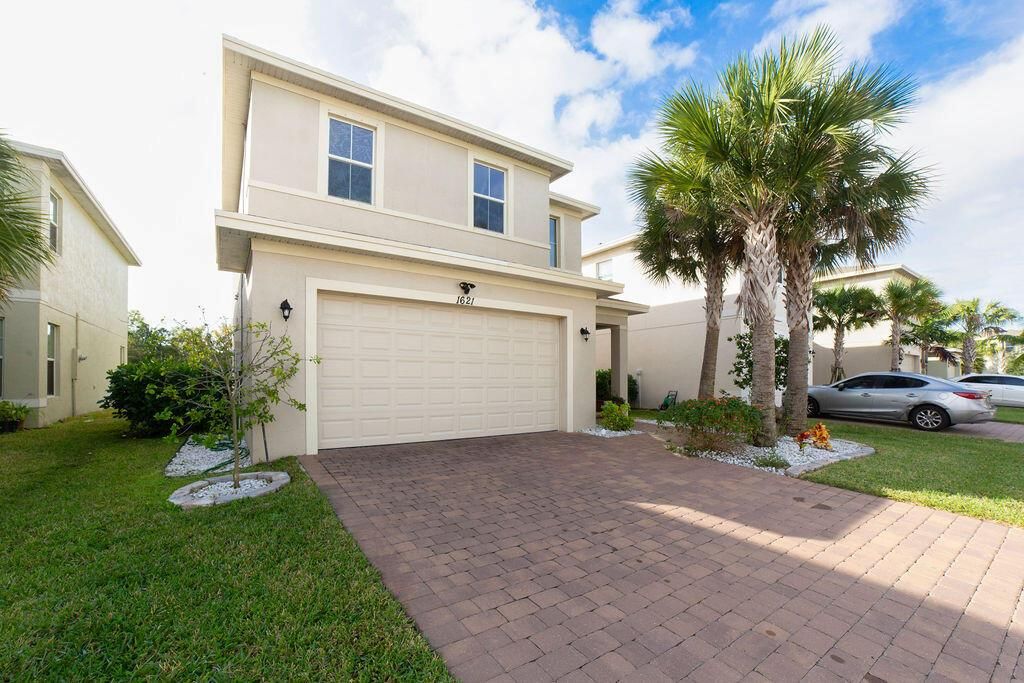 Photo of 1621 NW Cataluna Circle, Port Saint Lucie, FL 34986 (MLS # R11044191)