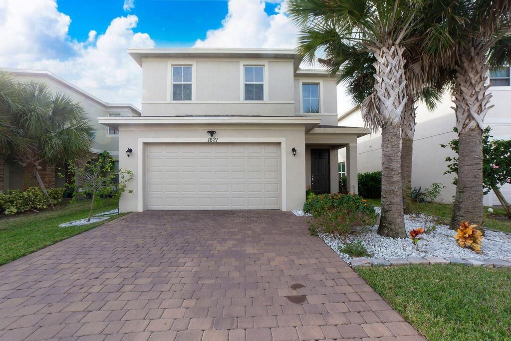 Photo of 1621 NW Cataluna Circle, Port St Lucie, FL 34986 (MLS # R11044191)