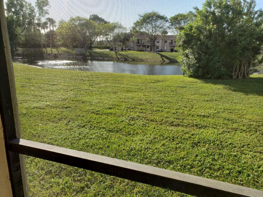 Updated 2 bedroom 2 bath residence with a lake view. No carpet. Washer and Dryer. Perfect location in central Boca Raton.