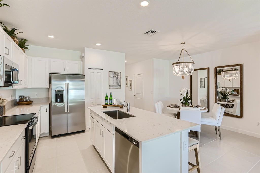 Photo of 822 SE Grovebush Lane, Port Saint Lucie, FL 34984 (MLS # R11136959)