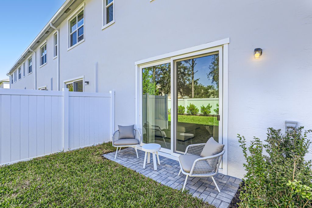 Photo of 822 SE Grovebush Lane, Port Saint Lucie, FL 34984 (MLS # R11136959)