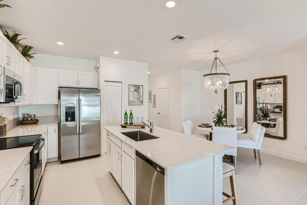 Photo of 822 SE Grovebush Lane, Port Saint Lucie, FL 34984 (MLS # R11136959)