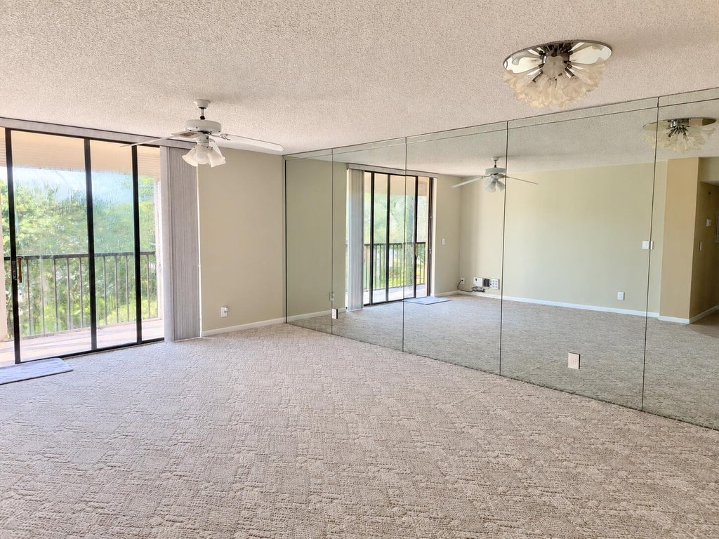 Photo of 5130 Las Verdes Circle #301, Delray Beach, FL 33484 (MLS # B26072199)