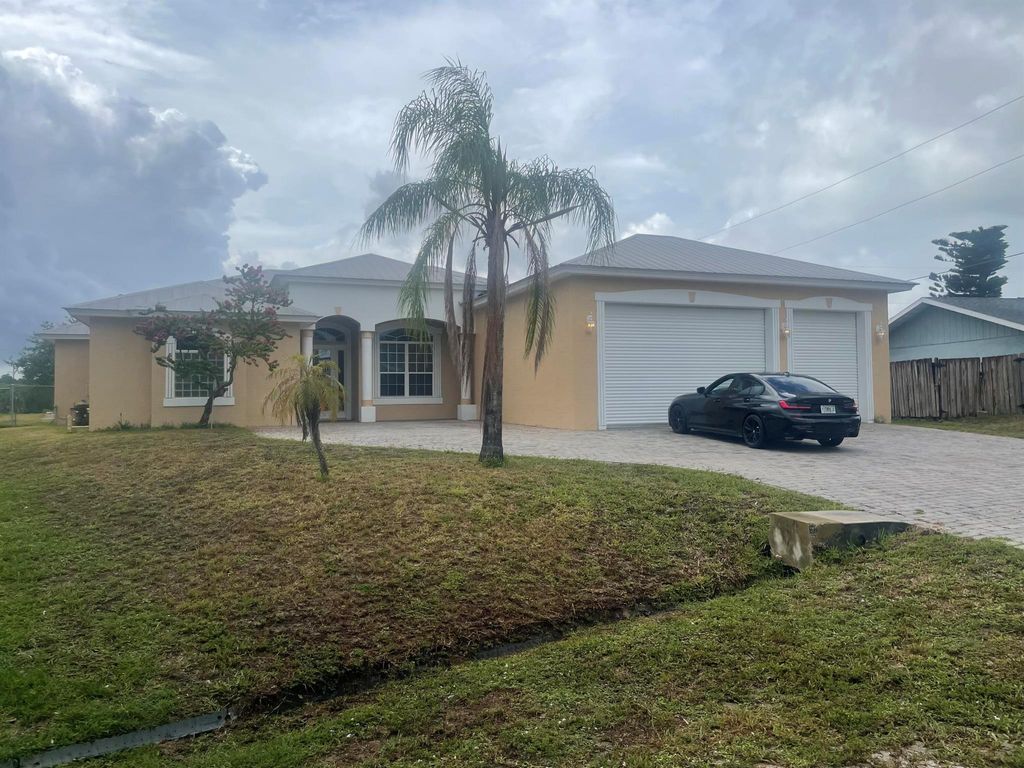 Photo of 2643 SW Harem Circle, Port Saint Lucie, FL 34953 (MLS # R10988775)
