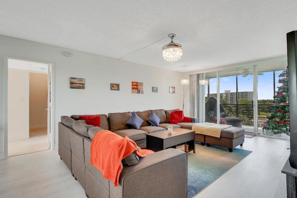 Photo of 3800 Oaks Clubhouse Drive #503, Pompano Beach, FL 33069 (MLS # R11158431)