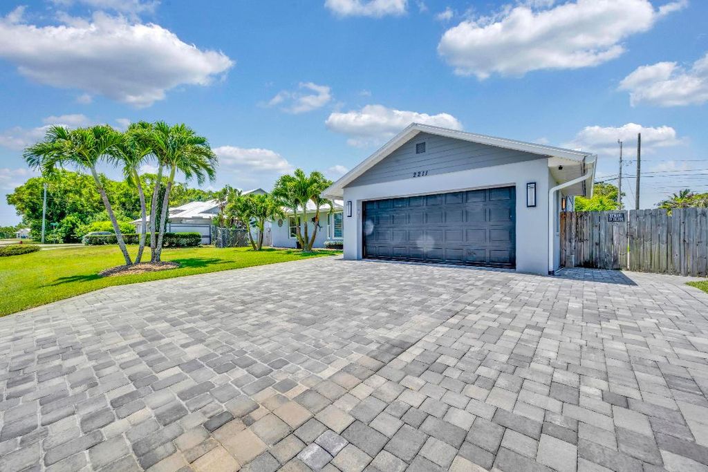 Photo of 2211 SE Mandrake Circle, Port Saint Lucie, FL 34952 (MLS # R10986864)