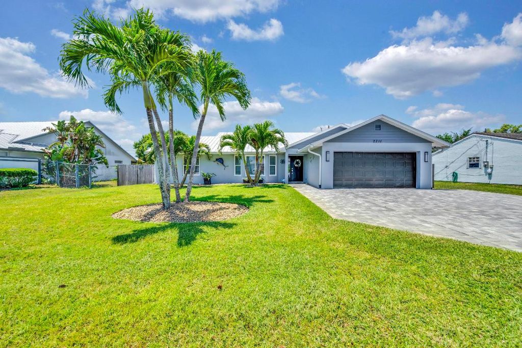 Photo of 2211 SE Mandrake Circle, Port Saint Lucie, FL 34952 (MLS # R10986864)