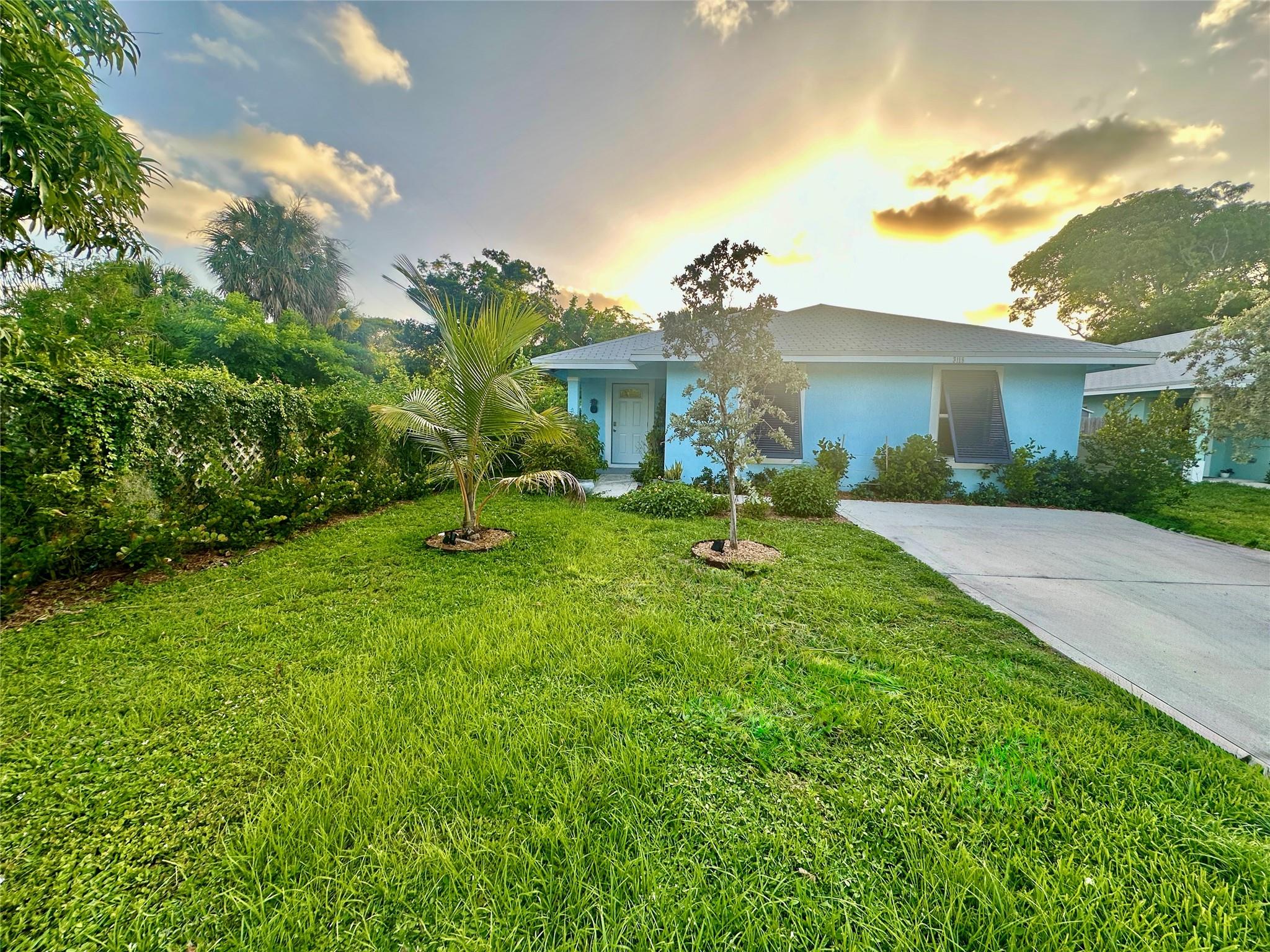 Welcome to Paradise. - 2021 Construction Concrete Block/CBS house. Tile floors throughout. Metal stud interior walls (less termite risk). Impact resistant windows & doors. Vaulted Ceiling in living area. East of 95. Walking distance to intracoastal, Northwood Village (coffee/restaurants/shopping), Currie Park (which is undergoing renovations.). 6-minute drive to NoRa or outlet malls. 10-minute drive to Downtown WPB or Rosemary Square. Very close to Broadway Corridor Redevelopment efforts. Upgraded closets in 2 out of 3 rooms). Water filtration system. Solar Panels (consistent energy bills each month). Expandable back yard out to property line. Small storage shed. Soft close drawers throughout. Quiet zone (no train horns). Only one owner in this recently constructed home.