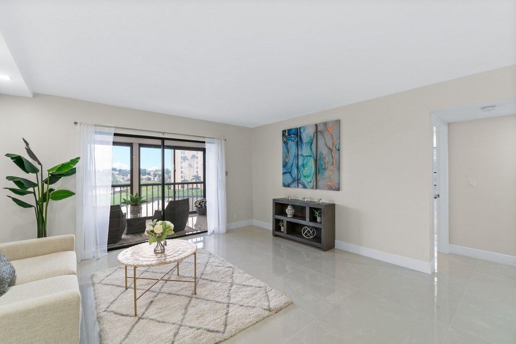 Photo of 7270 Ashford Place #408, Delray Beach, FL 33446 (MLS # R10923853)