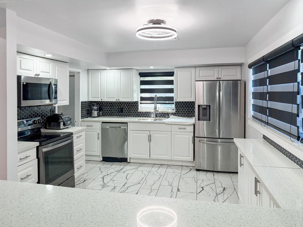 Photo of 4919 Pine Knott Lane, West Palm Beach, FL 33417 (MLS # R11168363)