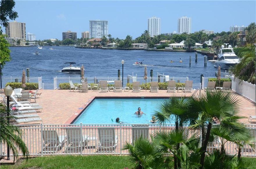 ****35 foot boatslip included****No fixed bridges****You can also install a boat lift at your own dock.****This is a fully renovated unit with grand views of Lake Santa Barbara and the pool area. The unit comes with a covered parking space for your car and a 30 foot plus balcony, accessible from all rooms.This property is "unique" at this price ,  with the boat slip,  underground parking space, and brand new hurricane windows have just been installed. Boat slip.