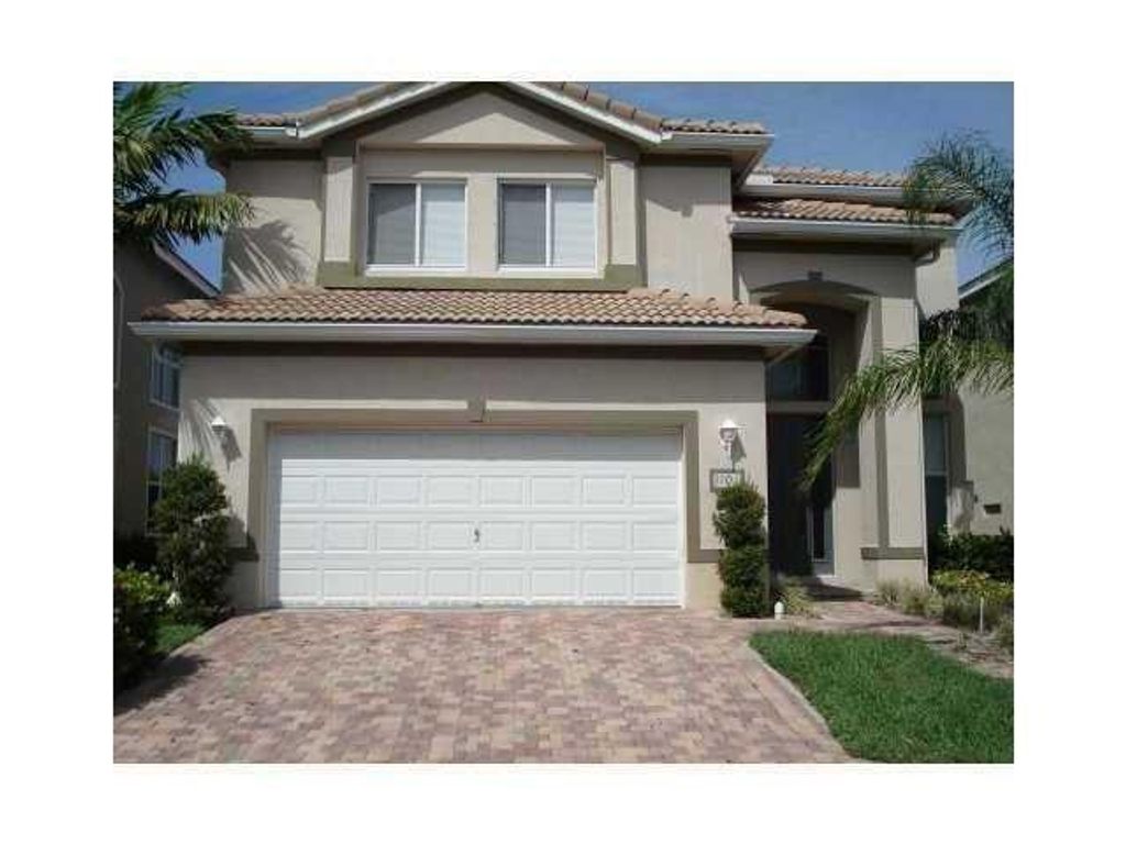 Photo of 1101 Center Stone Lane, Riviera Beach, FL 33404 (MLS # F10551532)