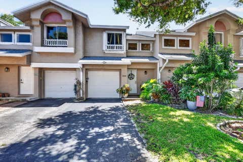 Photo of 2260 Discovery Circle W, Deerfield Beach, FL 33442 (MLS # B26063878)