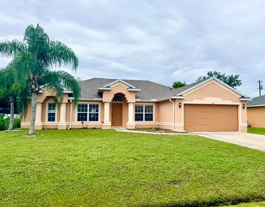 Photo of 530 SW Butler Avenue, Port Saint Lucie, FL 34983 (MLS # B26034880)