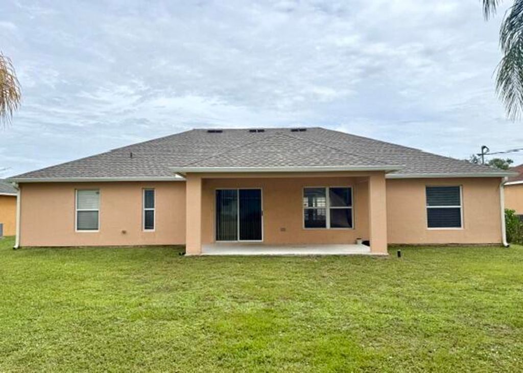Photo of 530 SW Butler Avenue, Port Saint Lucie, FL 34983 (MLS # B26034880)