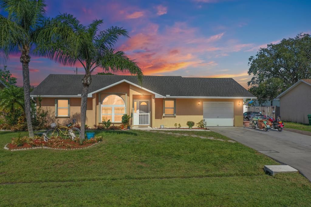 Photo of 2431 SE Marseille Street, Port St Lucie, FL 34952 (MLS # R10889045)