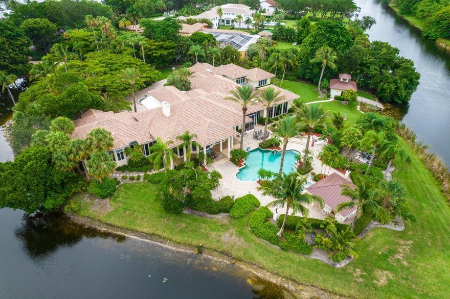 FIRST TIME ON THE MARKET IN LE LAC.
EXQUISITE ESTATE SITUATED ON A PRIME LOT (SURROUNDED BY 2 SIDES WATER)

Boca Raton's most prestigious and private lakefront, gated community. Enter through your private gate and be greeted by an arboring driveway of lush trees and mature landscape. This home features 7,330 sf under air. Perfectly flowing 1 story floor plan with 4 BEDROOMS, A MOVIE THEATRE, 2 HOME OFFICES, A GUEST HOUSE, A BOATHOUSE, GORGEOUS OVERSIZED POOL AND OUTDOOR KITCHEN. 
BRAND NEW ROOF! 

LE LAC is the ONLY guard gated, lakefront community that allows for motor boats & water sports. With only 32 Lot sites, Le Lac boasts 200 acres, 70 of which are spectacular lakes.
