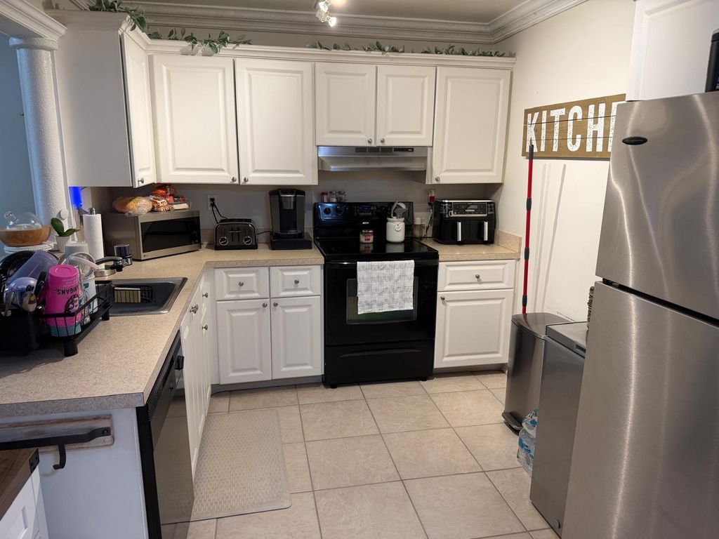 Photo of 711 N Pine Island Road #104, Plantation, FL 33324 (MLS # B26002956)