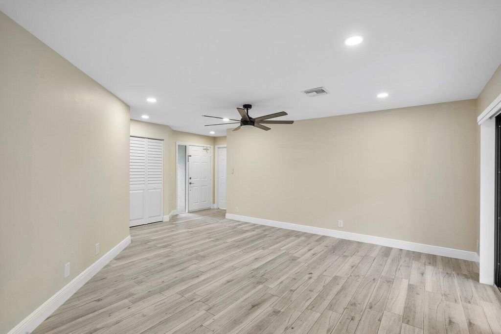 Photo of 11 Lexington Lane E #C, Palm Beach Gardens, FL 33418 (MLS # R11065395)